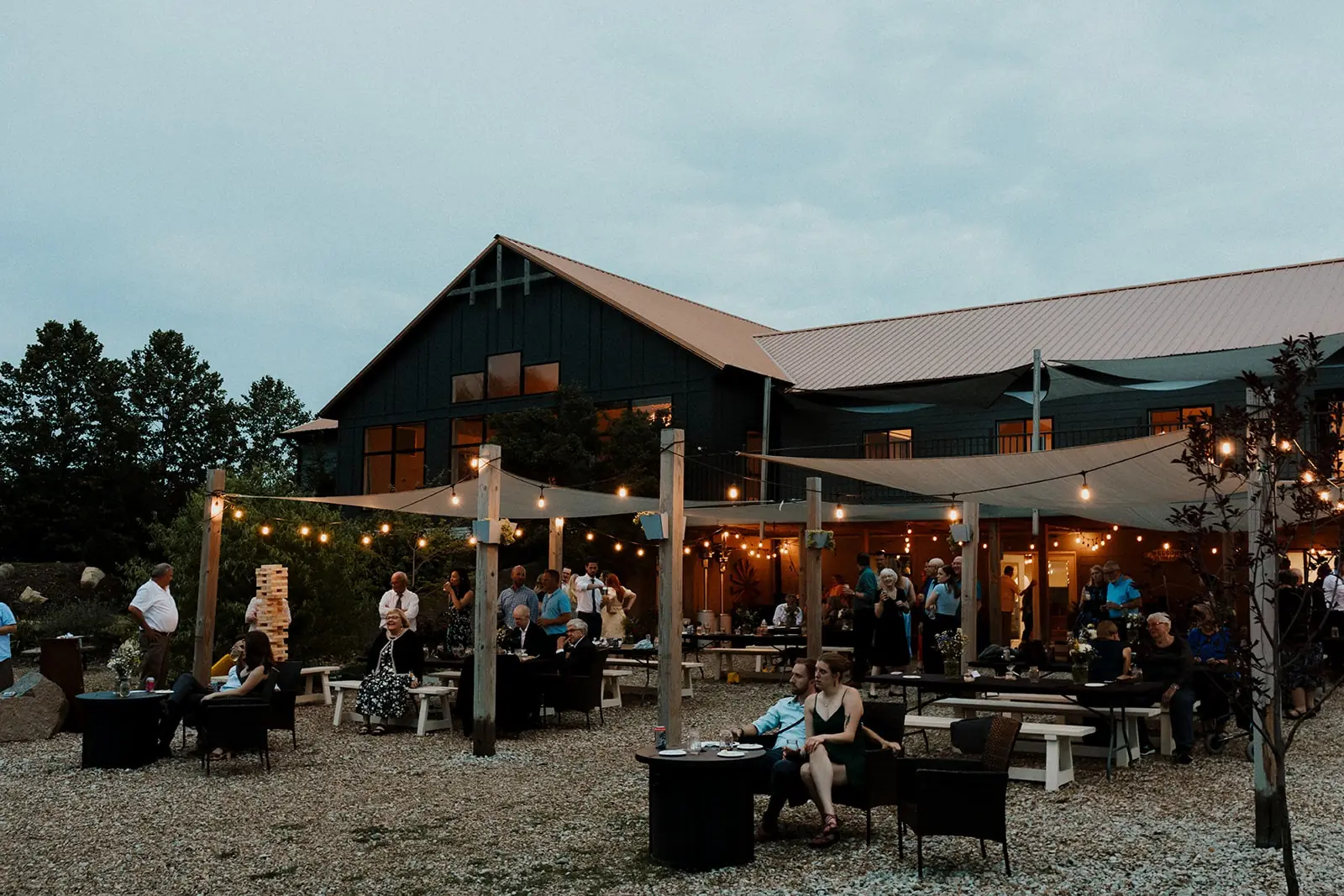 The patio and bar under string lights