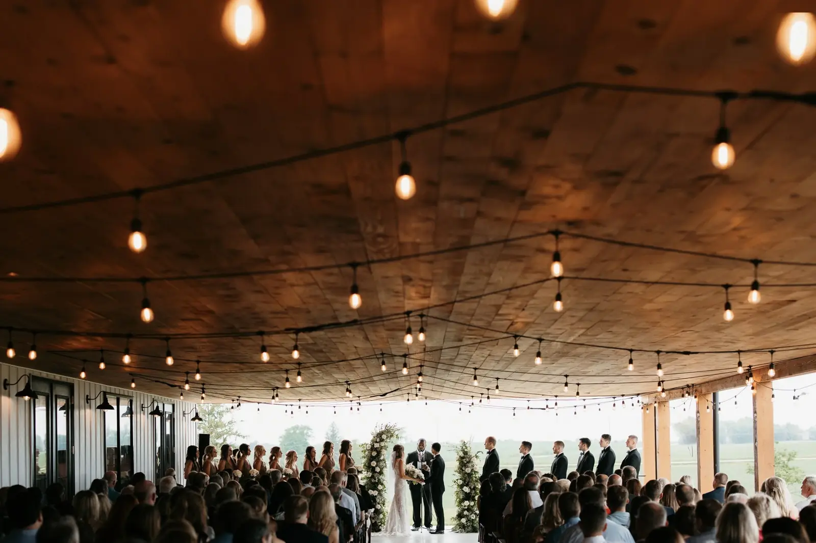 A ceremony on the string-lit porch