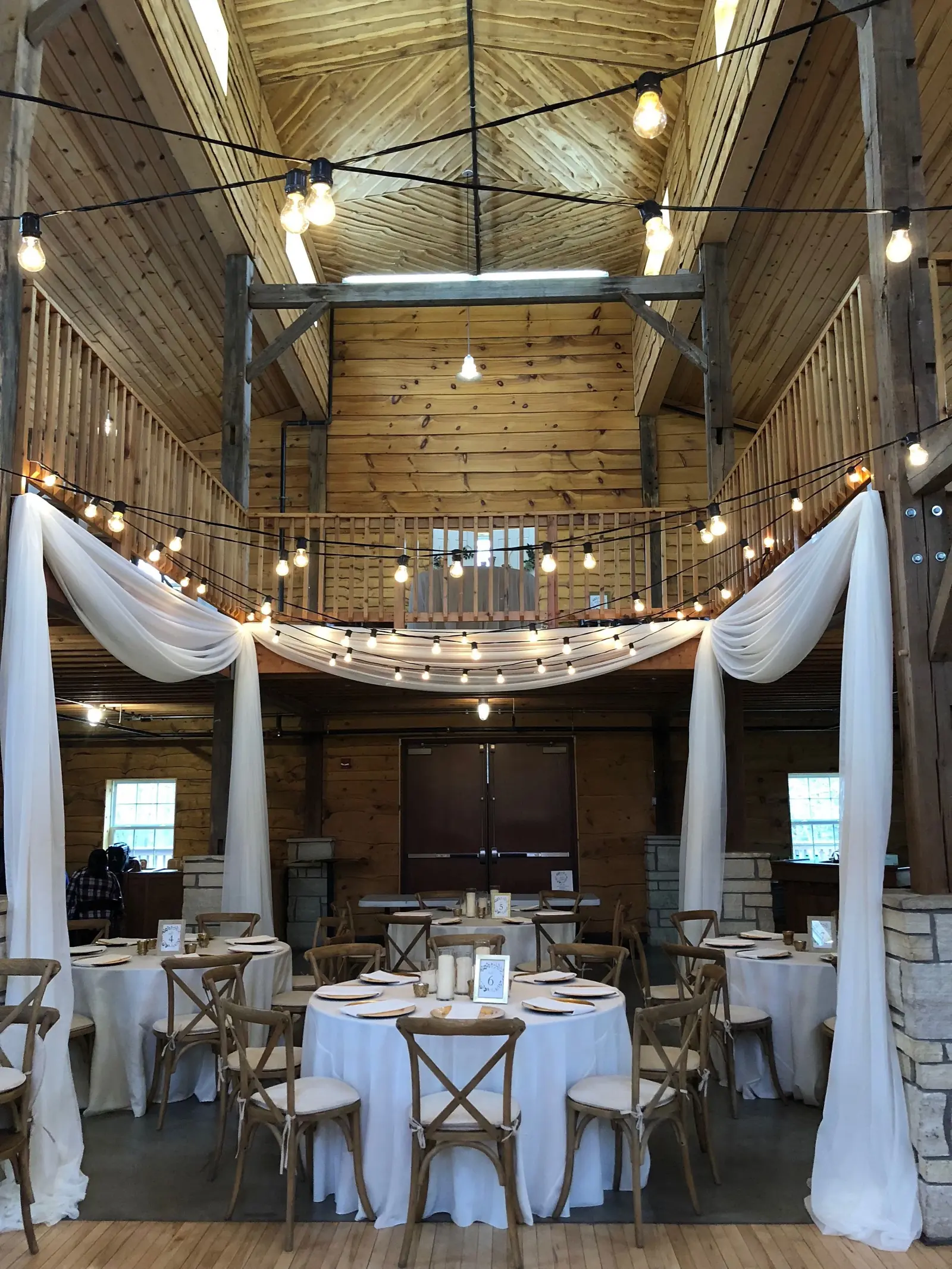 The Timber Frame barn with its loft and draped aisle