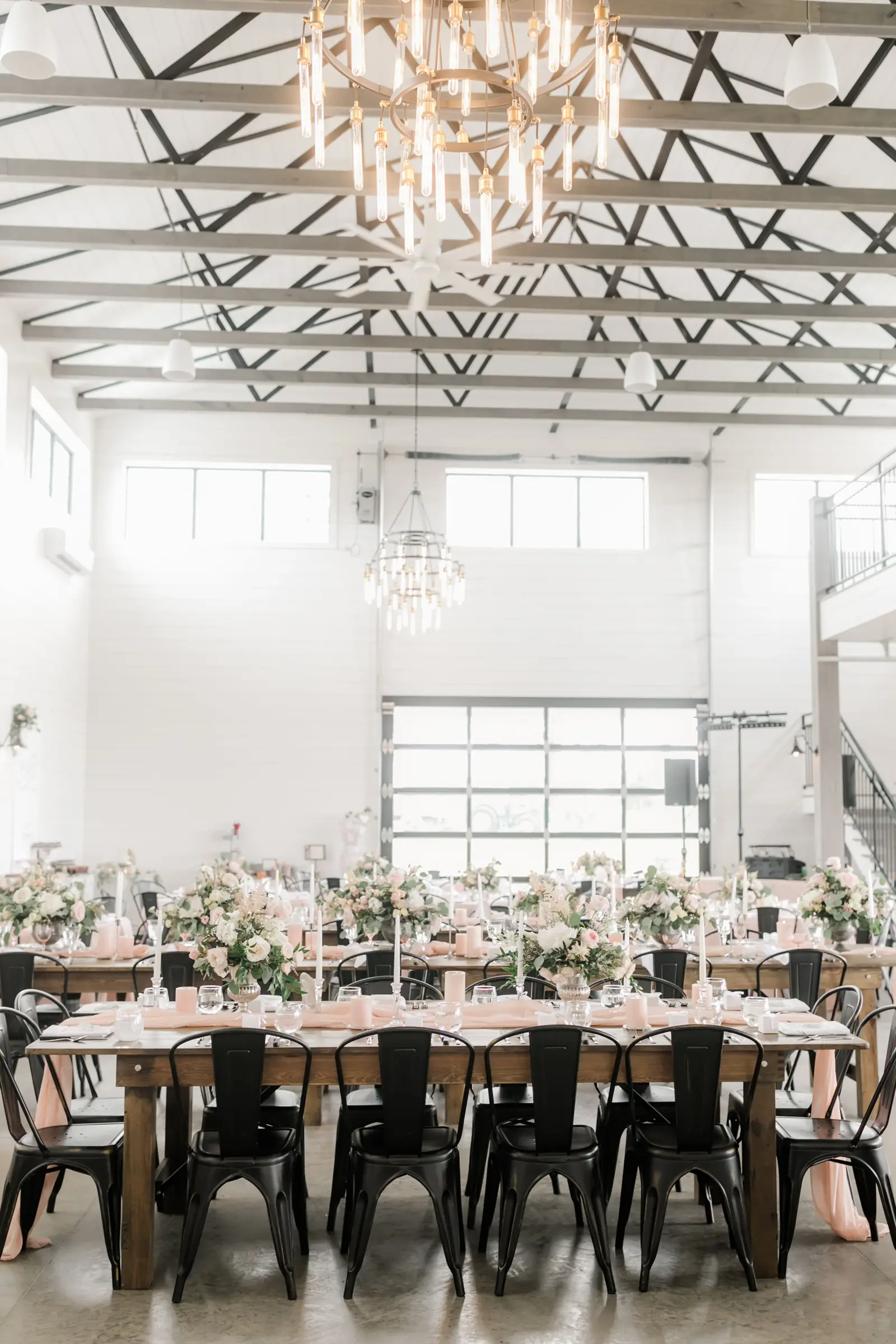 The bright white dining hall and its roll-up glass door