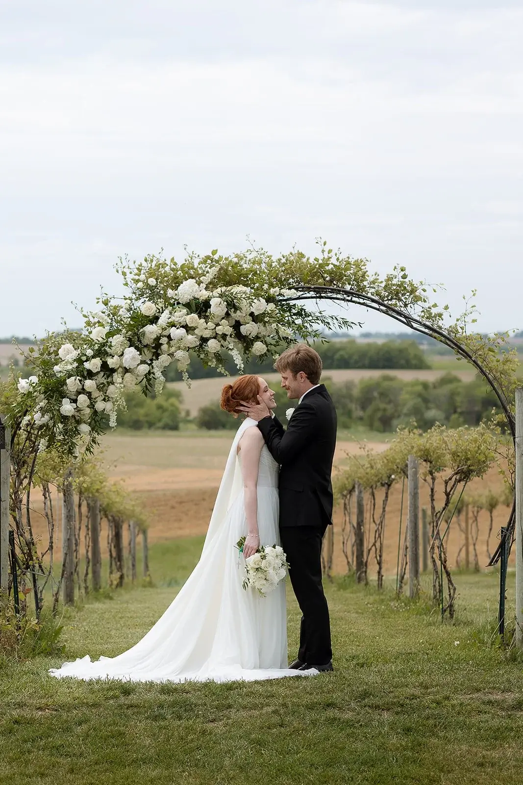 Under the floral arch