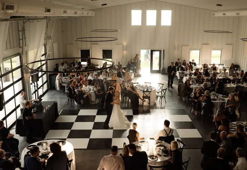 A full reception around the checkerboard dance floor